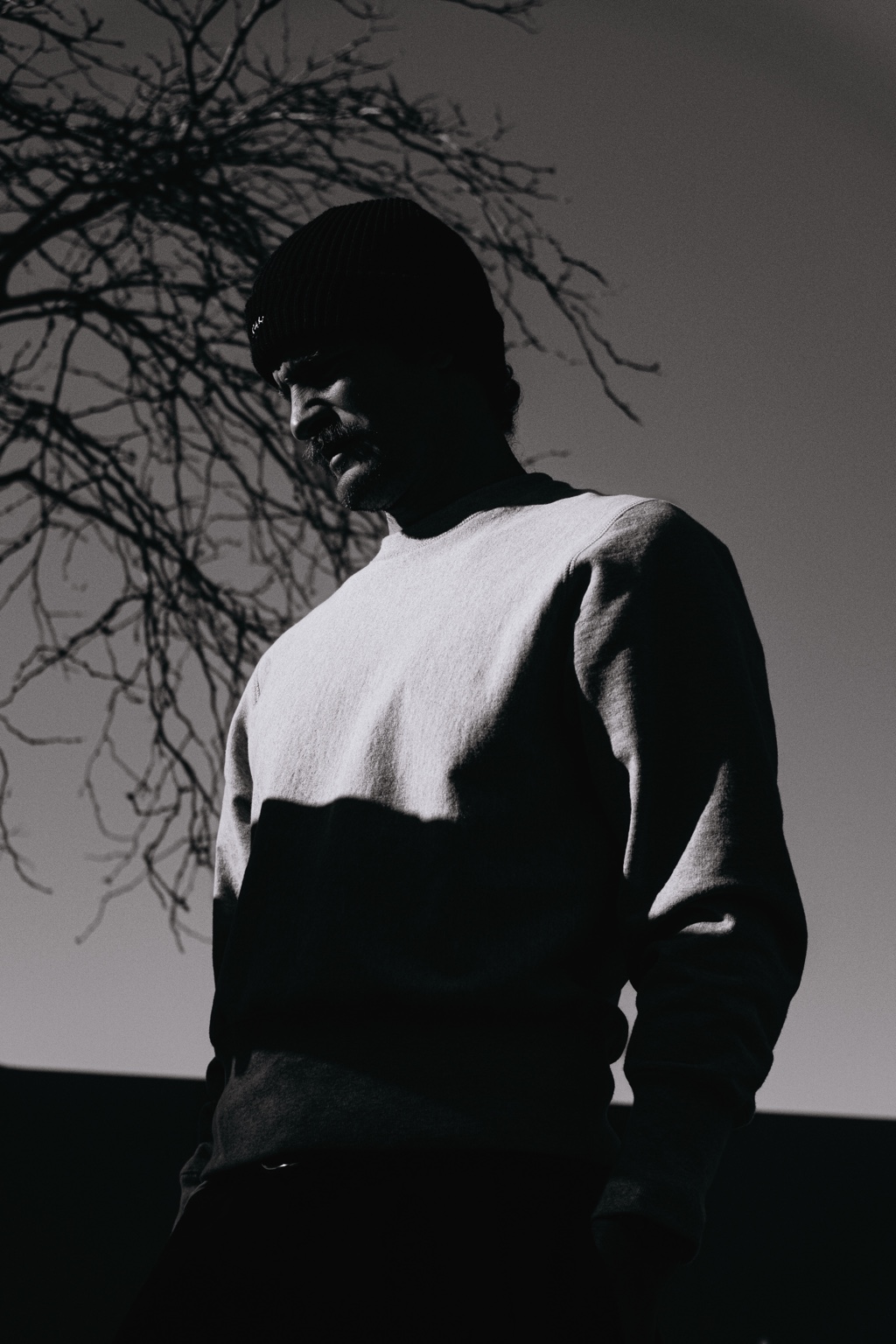 Low-angle portrait in strong winter light